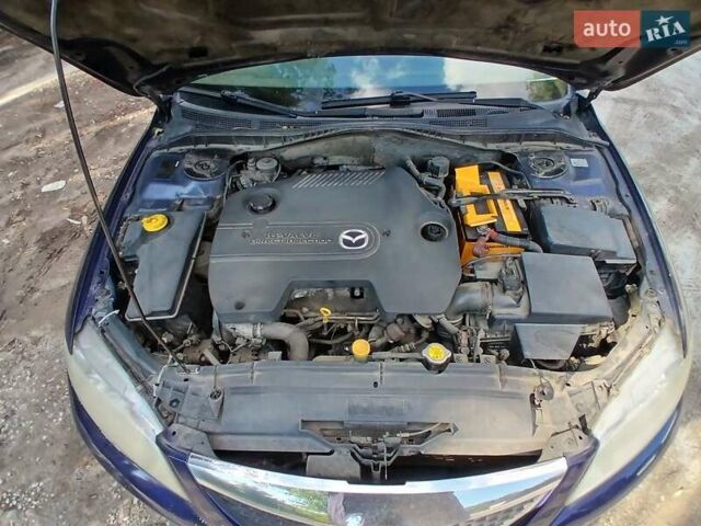 Синій Мазда 6, об'ємом двигуна 2 л та пробігом 304 тис. км за 2058 $, фото 7 на Automoto.ua