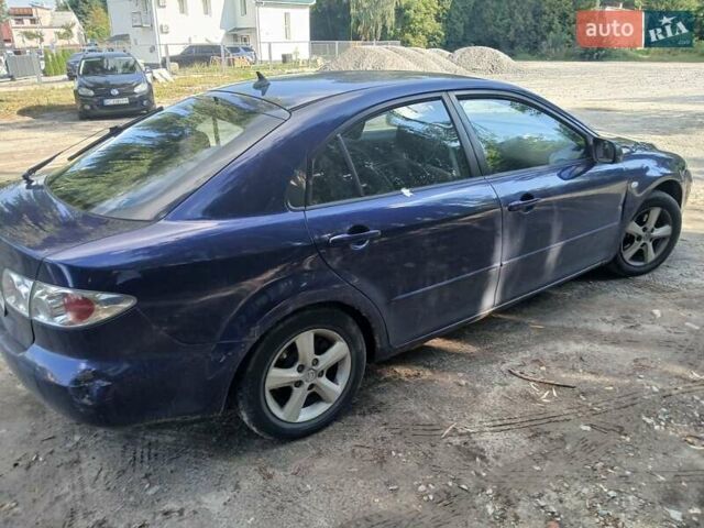 Синій Мазда 6, об'ємом двигуна 2 л та пробігом 304 тис. км за 2058 $, фото 9 на Automoto.ua