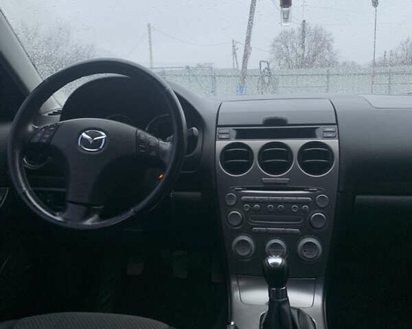 Синій Мазда 6, об'ємом двигуна 2.3 л та пробігом 257 тис. км за 5500 $, фото 14 на Automoto.ua