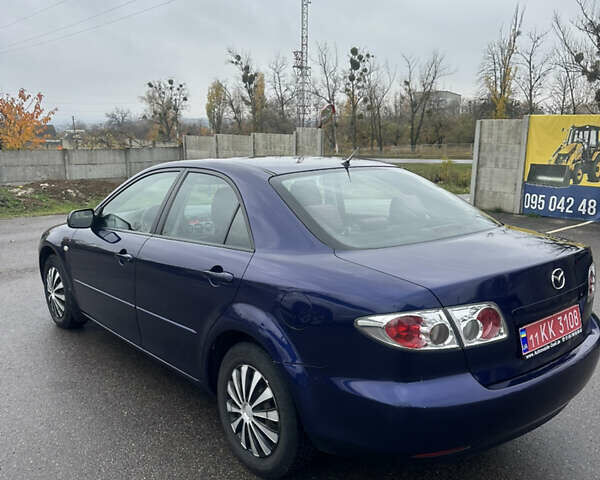 Синий Мазда 6, объемом двигателя 1.8 л и пробегом 168 тыс. км за 4800 $, фото 3 на Automoto.ua
