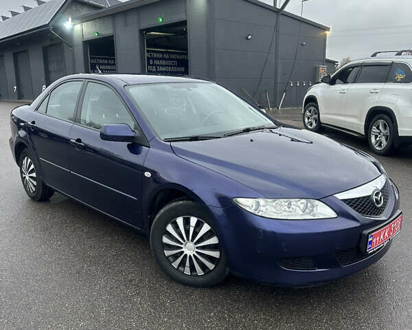 Синий Мазда 6, объемом двигателя 1.8 л и пробегом 168 тыс. км за 4800 $, фото 2 на Automoto.ua