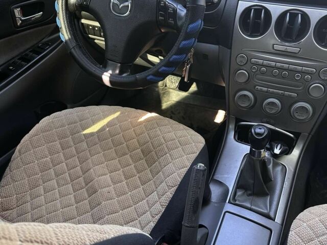 Синий Мазда 6, объемом двигателя 2 л и пробегом 389 тыс. км за 3980 $, фото 4 на Automoto.ua