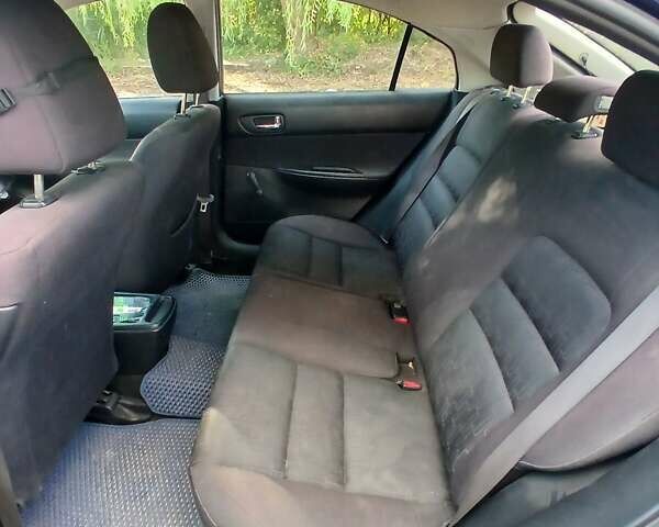 Синій Мазда 6, об'ємом двигуна 2 л та пробігом 304 тис. км за 2058 $, фото 28 на Automoto.ua