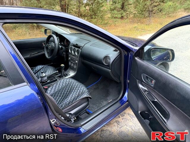 Синій Мазда 6, об'ємом двигуна 2 л та пробігом 247 тис. км за 3950 $, фото 10 на Automoto.ua