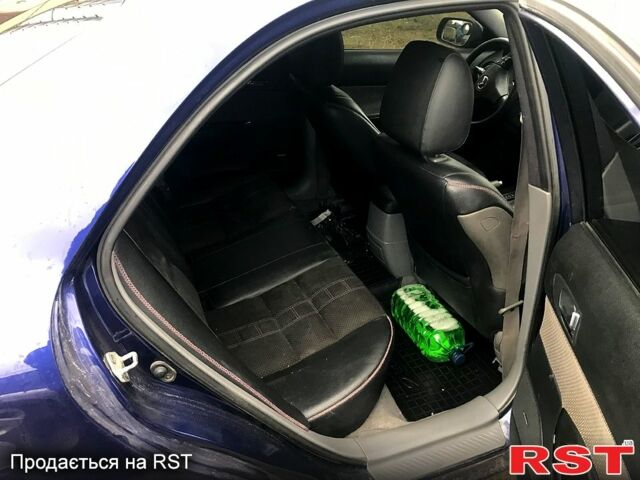 Синий Мазда 6, объемом двигателя 2 л и пробегом 230 тыс. км за 5000 $, фото 4 на Automoto.ua