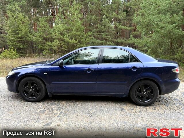 Синій Мазда 6, об'ємом двигуна 2 л та пробігом 247 тис. км за 3950 $, фото 4 на Automoto.ua