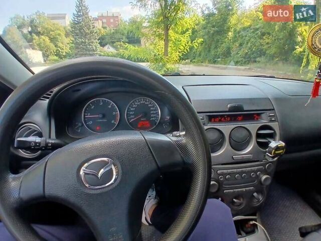 Синій Мазда 6, об'ємом двигуна 2 л та пробігом 304 тис. км за 2058 $, фото 10 на Automoto.ua