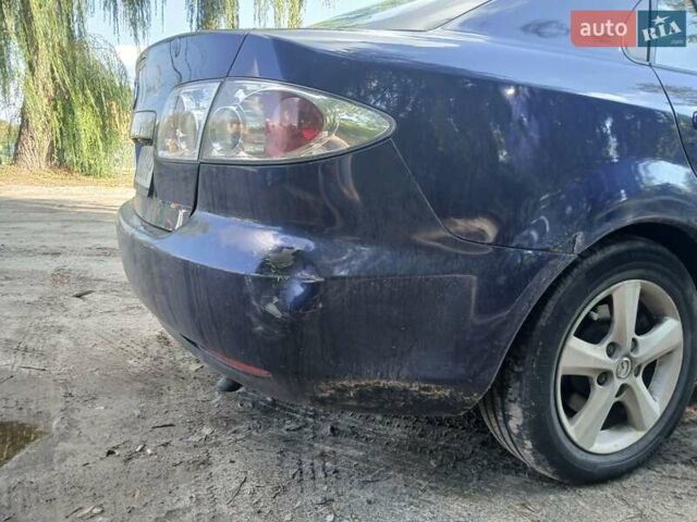 Синій Мазда 6, об'ємом двигуна 2 л та пробігом 304 тис. км за 2058 $, фото 8 на Automoto.ua