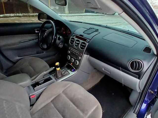Синій Мазда 6, об'ємом двигуна 2 л та пробігом 23100 тис. км за 2350 $, фото 8 на Automoto.ua