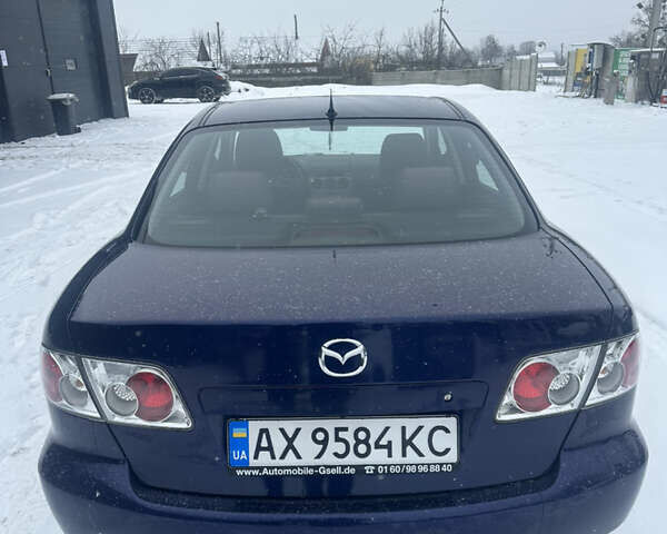 Синий Мазда 6, объемом двигателя 1.8 л и пробегом 169 тыс. км за 5000 $, фото 1 на Automoto.ua