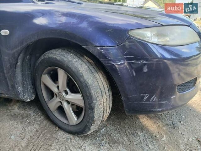 Синій Мазда 6, об'ємом двигуна 2 л та пробігом 304 тис. км за 2058 $, фото 12 на Automoto.ua