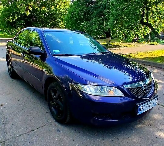 Синій Мазда 6, об'ємом двигуна 2 л та пробігом 317 тис. км за 3400 $, фото 2 на Automoto.ua