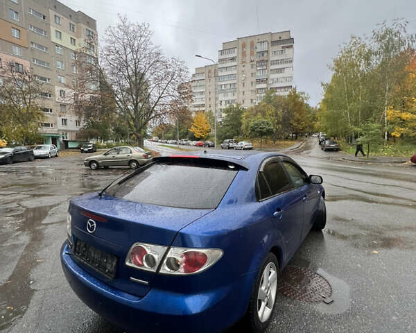 Синий Мазда 6, объемом двигателя 2 л и пробегом 326 тыс. км за 2800 $, фото 2 на Automoto.ua