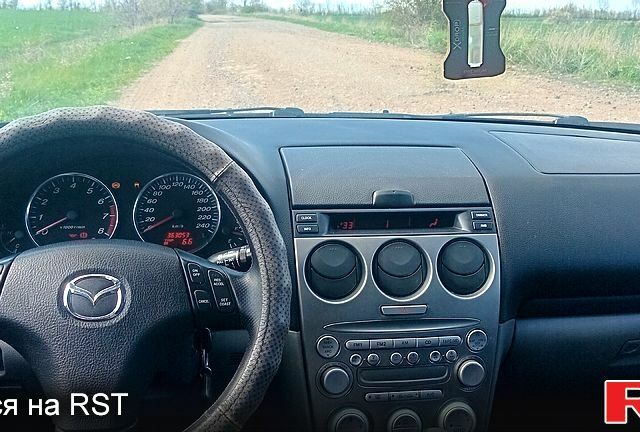 Синий Мазда 6, объемом двигателя 1.8 л и пробегом 360 тыс. км за 3000 $, фото 8 на Automoto.ua