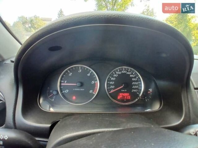 Синій Мазда 6, об'ємом двигуна 2 л та пробігом 304 тис. км за 2058 $, фото 24 на Automoto.ua