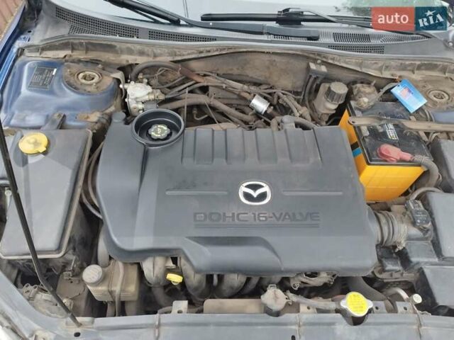 Синий Мазда 6, объемом двигателя 1.8 л и пробегом 379 тыс. км за 3300 $, фото 2 на Automoto.ua
