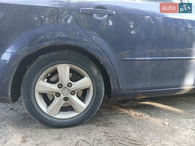 Синій Мазда 6, об'ємом двигуна 2 л та пробігом 304 тис. км за 2058 $, фото 21 на Automoto.ua
