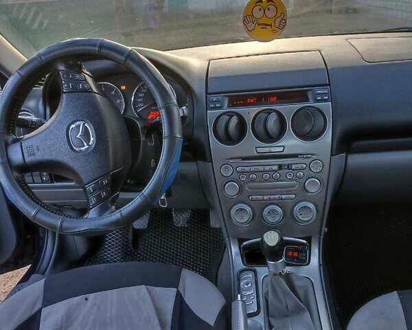 Синий Мазда 6, объемом двигателя 2 л и пробегом 340 тыс. км за 3350 $, фото 3 на Automoto.ua