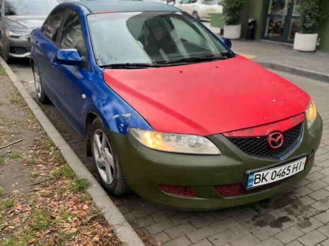 Синий Мазда 6, объемом двигателя 2 л и пробегом 450 тыс. км за 2000 $, фото 1 на Automoto.ua