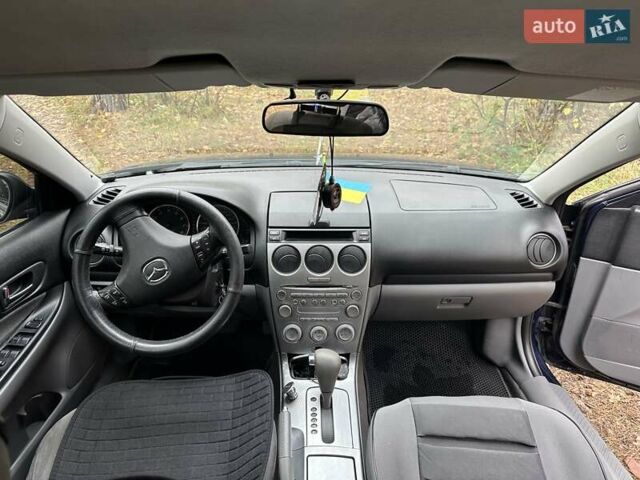 Синий Мазда 6, объемом двигателя 2 л и пробегом 286 тыс. км за 3800 $, фото 1 на Automoto.ua