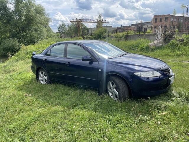 Синій Мазда 6, об'ємом двигуна 2 л та пробігом 321 тис. км за 3600 $, фото 7 на Automoto.ua