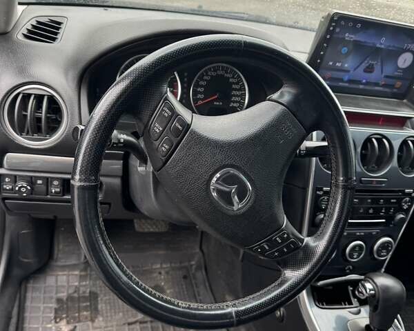 Синий Мазда 6, объемом двигателя 2 л и пробегом 322 тыс. км за 5650 $, фото 7 на Automoto.ua