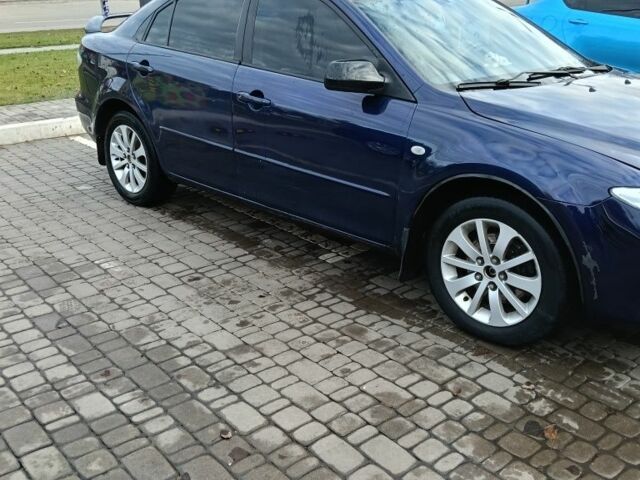 Синий Мазда 6, объемом двигателя 2 л и пробегом 305 тыс. км за 4720 $, фото 2 на Automoto.ua