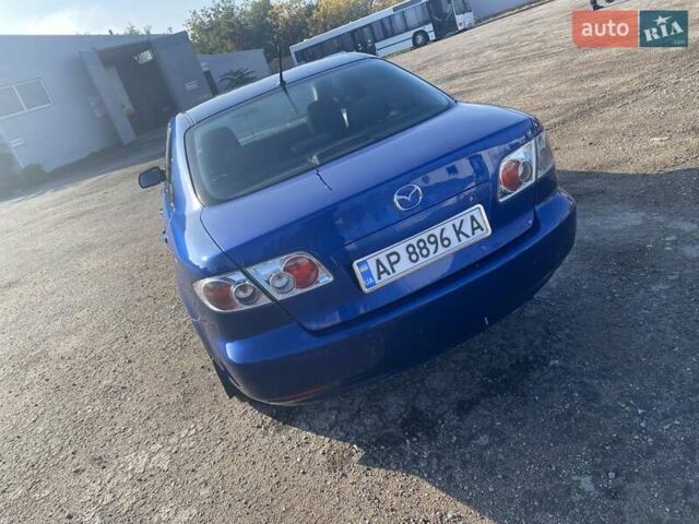 Синий Мазда 6, объемом двигателя 2 л и пробегом 230 тыс. км за 3500 $, фото 2 на Automoto.ua