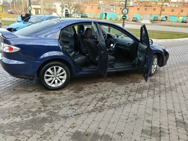 Синий Мазда 6, объемом двигателя 2 л и пробегом 305 тыс. км за 4720 $, фото 14 на Automoto.ua