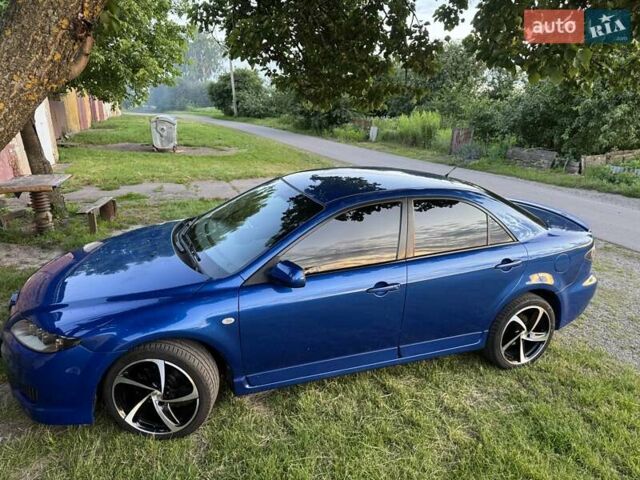 Синий Мазда 6, объемом двигателя 2 л и пробегом 322 тыс. км за 5650 $, фото 29 на Automoto.ua