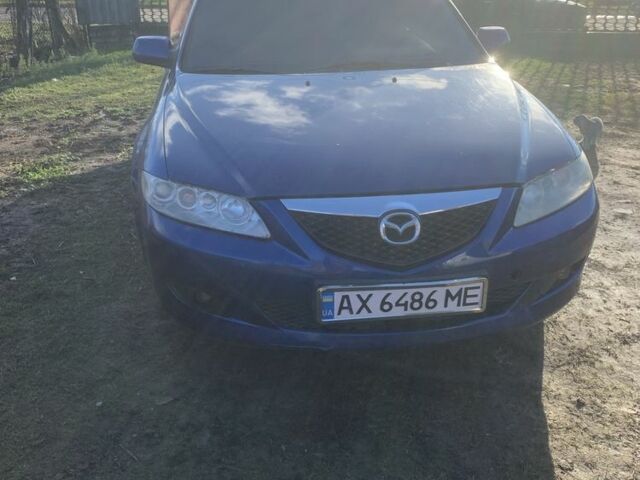Синий Мазда 6, объемом двигателя 2 л и пробегом 350 тыс. км за 1800 $, фото 4 на Automoto.ua