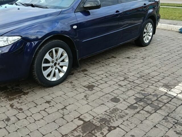 Синий Мазда 6, объемом двигателя 2 л и пробегом 305 тыс. км за 4720 $, фото 1 на Automoto.ua