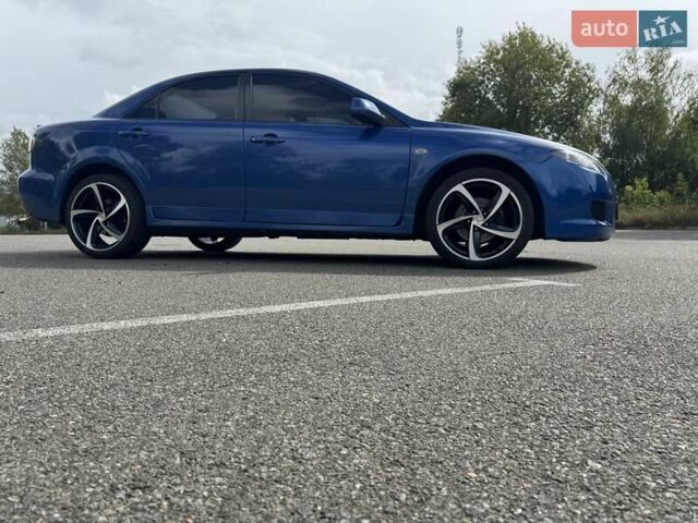 Синий Мазда 6, объемом двигателя 2 л и пробегом 322 тыс. км за 5650 $, фото 51 на Automoto.ua