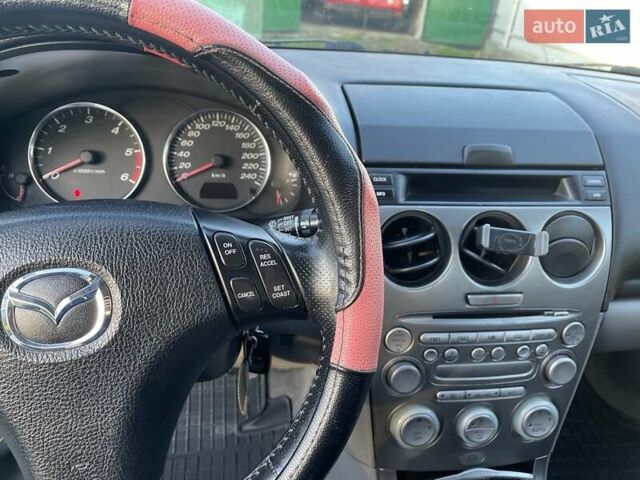 Синий Мазда 6, объемом двигателя 2 л и пробегом 367 тыс. км за 1800 $, фото 2 на Automoto.ua