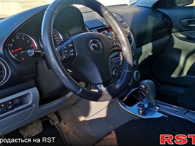 Синий Мазда 6, объемом двигателя 2 л и пробегом 270 тыс. км за 3900 $, фото 8 на Automoto.ua