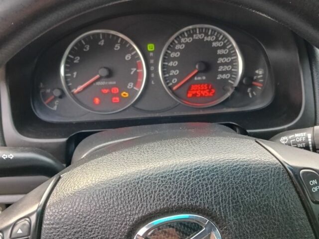 Синий Мазда 6, объемом двигателя 2 л и пробегом 305 тыс. км за 4720 $, фото 9 на Automoto.ua