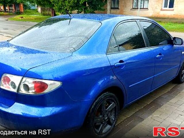 Синий Мазда 6, объемом двигателя 1.8 л и пробегом 231 тыс. км за 6200 $, фото 2 на Automoto.ua