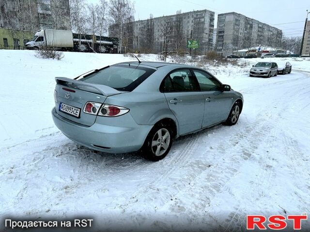 Синий Мазда 6, объемом двигателя 2 л и пробегом 300 тыс. км за 2950 $, фото 4 на Automoto.ua