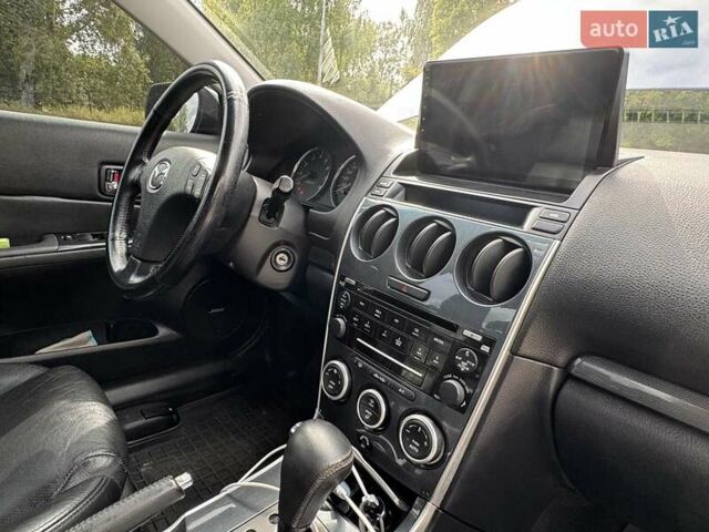 Синий Мазда 6, объемом двигателя 2 л и пробегом 322 тыс. км за 5650 $, фото 14 на Automoto.ua