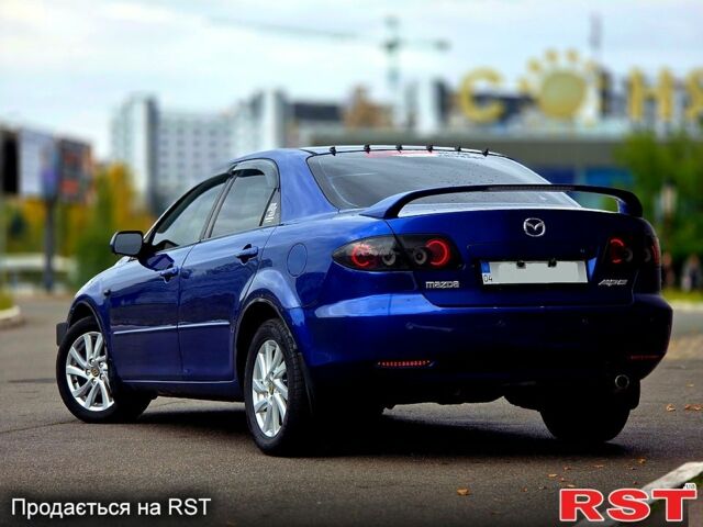 Синий Мазда 6, объемом двигателя 2 л и пробегом 307 тыс. км за 5500 $, фото 2 на Automoto.ua