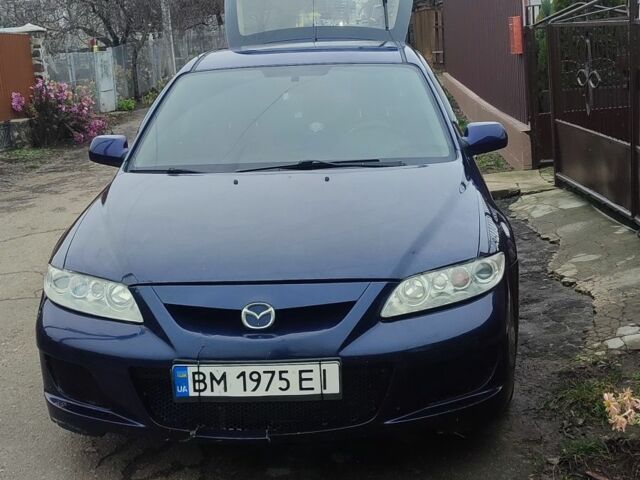 Синий Мазда 6, объемом двигателя 2 л и пробегом 300 тыс. км за 3000 $, фото 1 на Automoto.ua