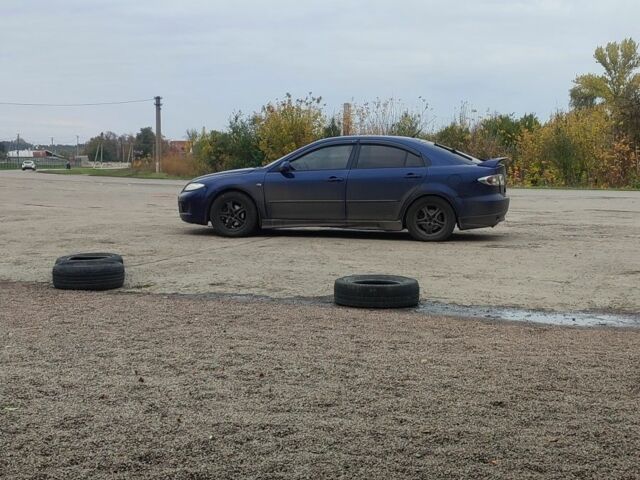 Синий Мазда 6, объемом двигателя 2 л и пробегом 300 тыс. км за 3000 $, фото 2 на Automoto.ua