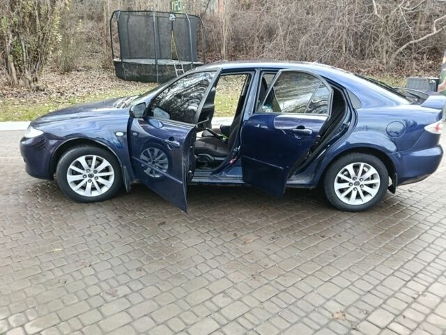 Синий Мазда 6, объемом двигателя 2 л и пробегом 305 тыс. км за 4720 $, фото 13 на Automoto.ua