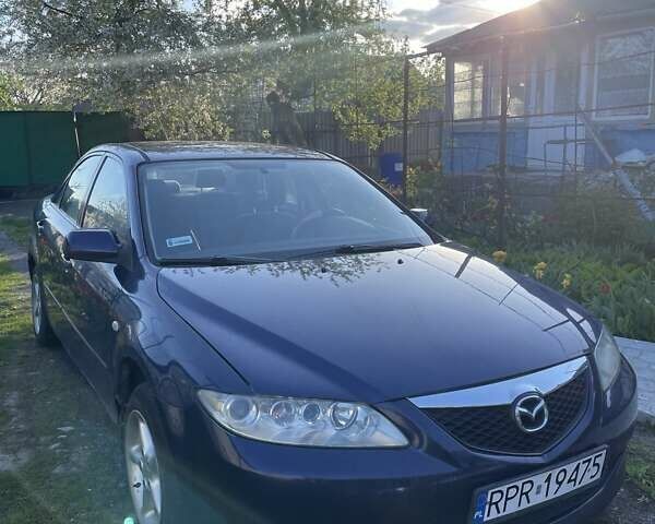 Синий Мазда 6, объемом двигателя 2 л и пробегом 367 тыс. км за 1800 $, фото 4 на Automoto.ua
