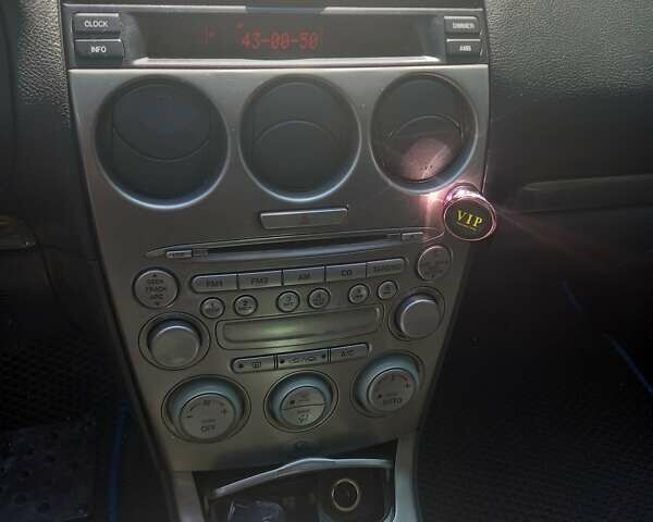 Синий Мазда 6, объемом двигателя 2 л и пробегом 390 тыс. км за 4500 $, фото 4 на Automoto.ua