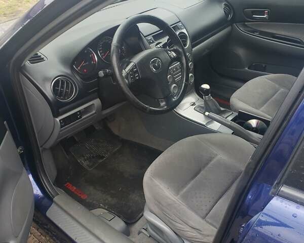 Синий Мазда 6, объемом двигателя 2 л и пробегом 308 тыс. км за 3700 $, фото 4 на Automoto.ua