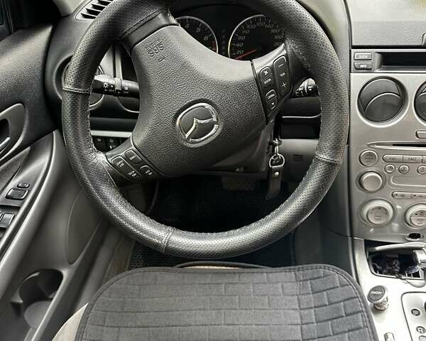 Синий Мазда 6, объемом двигателя 2 л и пробегом 286 тыс. км за 3800 $, фото 10 на Automoto.ua