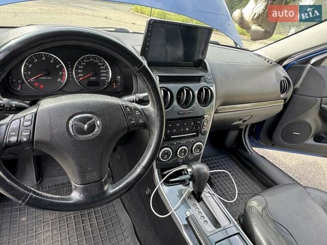 Синий Мазда 6, объемом двигателя 2 л и пробегом 322 тыс. км за 5650 $, фото 11 на Automoto.ua