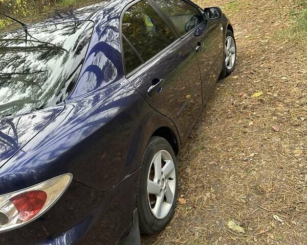 Синий Мазда 6, объемом двигателя 2 л и пробегом 286 тыс. км за 3800 $, фото 4 на Automoto.ua