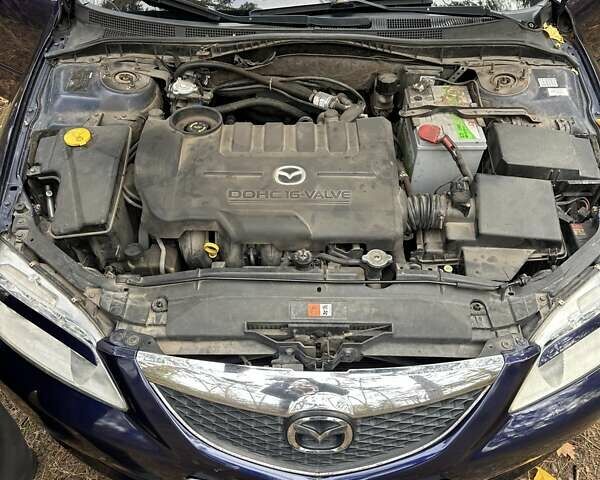 Синий Мазда 6, объемом двигателя 2 л и пробегом 286 тыс. км за 3800 $, фото 5 на Automoto.ua